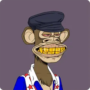 A Bored Ape NFT on a grey-purple background. It has a black hat with a visor, and is wearing a deep v-neck collared shirt with an American flag print. It has bloodshot, half-closed eyes and is baring a mouth full of gold teeth.