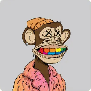 A brown ape with Xs over its eyes and rainbow-colored teeth, wearing an orange slouchy beanie and a purple and orange fur coat.
