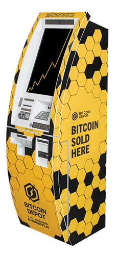 A yellow and black Bitcoin ATM with "Bitcoin sold here" printed on the side