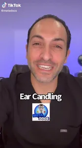 TikTok screenshot of a doctor wearing black scrubs, mid-sentence. There is overlaid text that says "Ear Candling" and a MetaDocs logo.