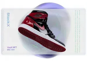 A rendering of a card, showing a photograph of a red high-top sneaker. The card has the branding "StockX" on it, as well as "Vault NFT ERC-1155"